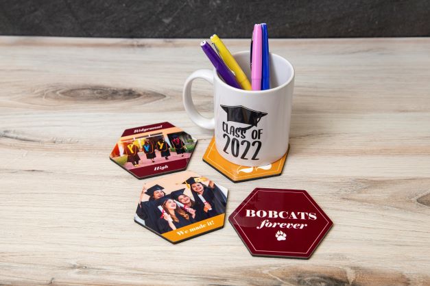 Coaster blanks personalized with high school memorabilia. 